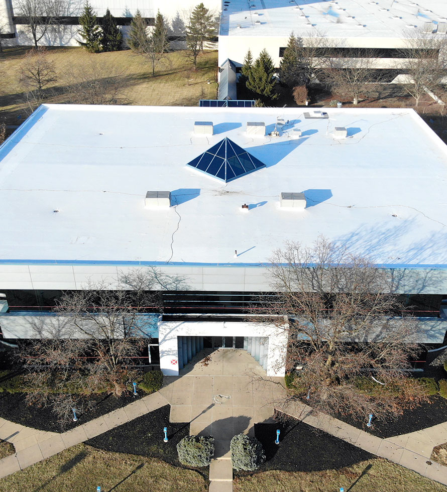 white reflective roof on commercial building