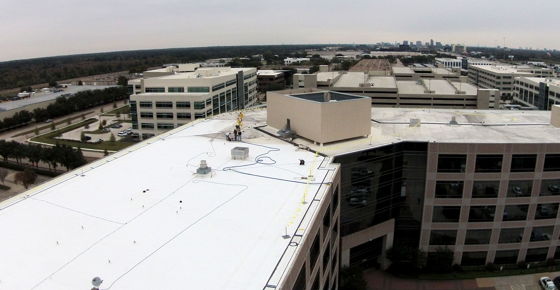 flat roof in a process of cleaning by CentiMark crews